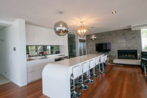 28 Kitchen Lounge area with fire place and built in seating.